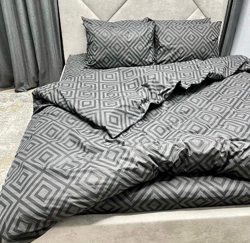 сіра постільна білизна з геометричним малюнком